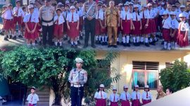 Kasat Lantas Polres Ende, IPTU I Gede Wisna memimpin langsung upacara bendera dalam program Police go to school di SDK St.Theresia Ende 3 /foto:Istimewa